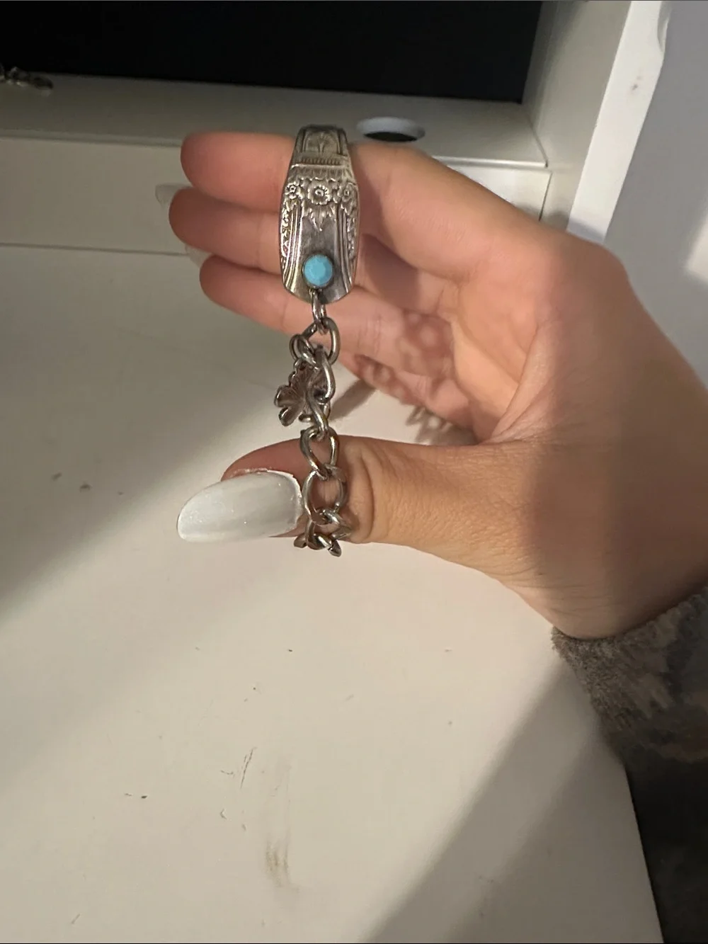 Silver Charm Chain Bracelet with Floral Accents